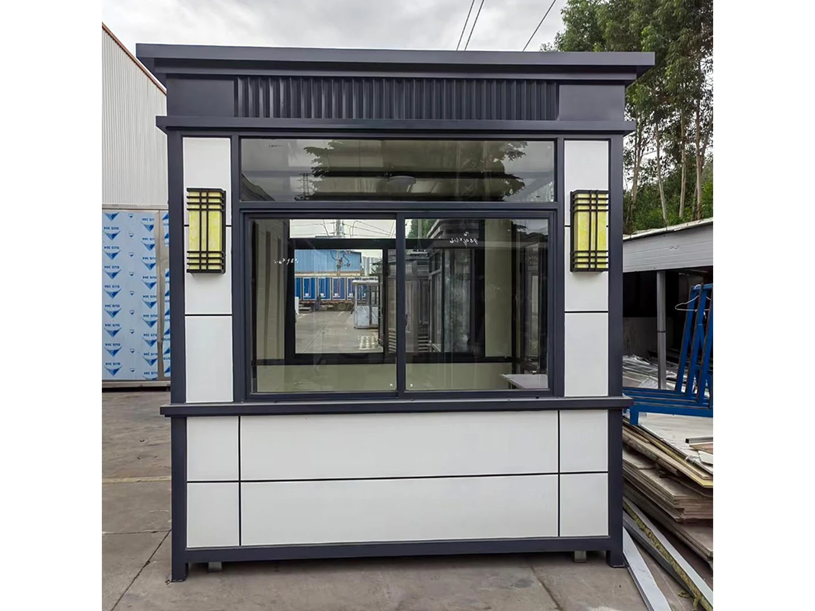 Chinese-Style Security Guard Booth with Black Frame and White Panels-1 Chinese-Style Security Guard Booth with Black Frame and White Panels