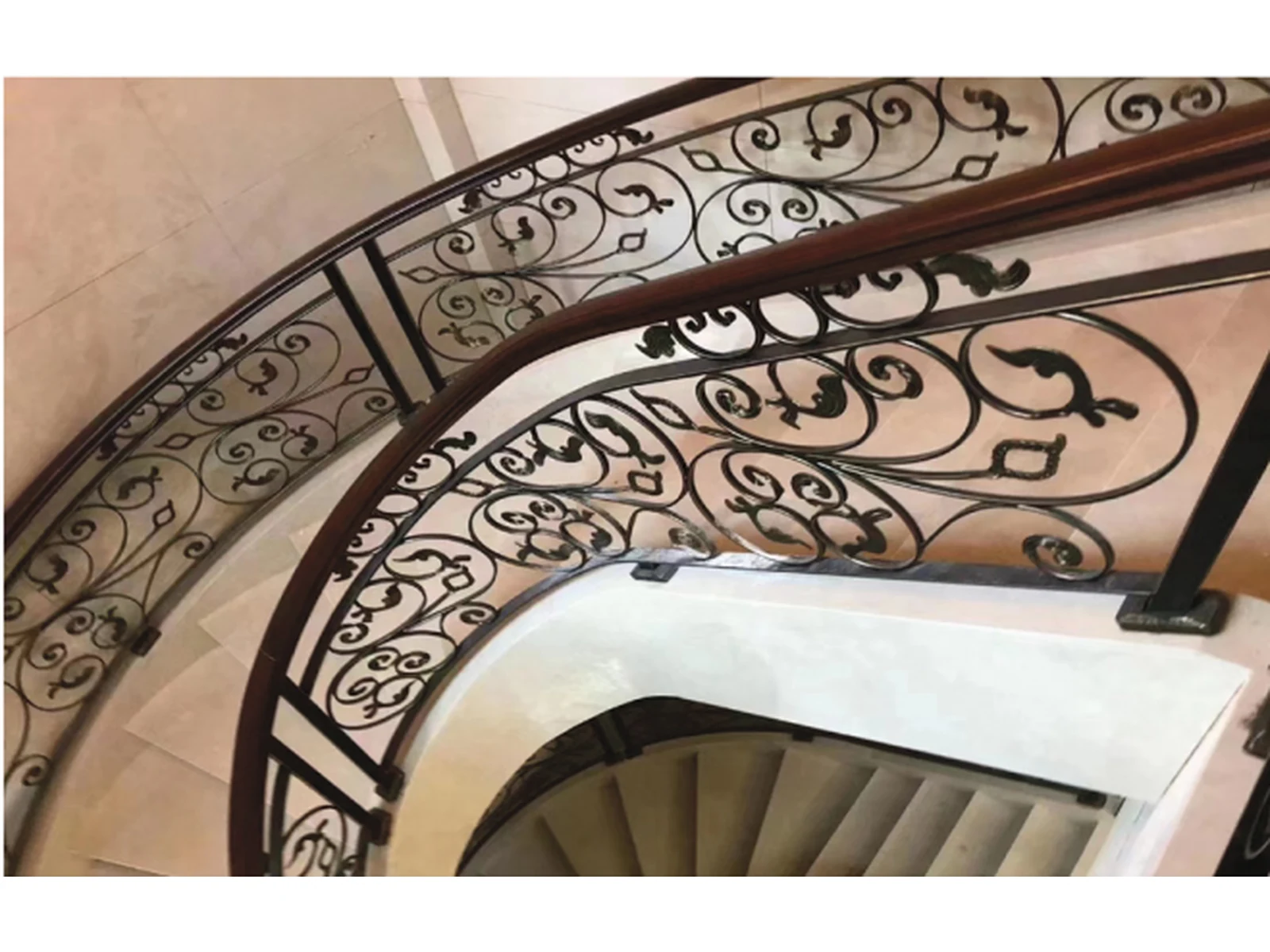 European Indoor Wrought Iron Curved Stair Railing with Black Ornate Panels and Wood Handrail-1 European Indoor Wrought Iron Curved Stair Railing with Black Ornate Panels and Wood Handrail