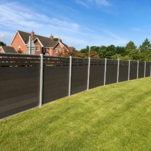 Modern Composite Privacy Fence with Dark Gray Horizontal Boards and Silver Posts